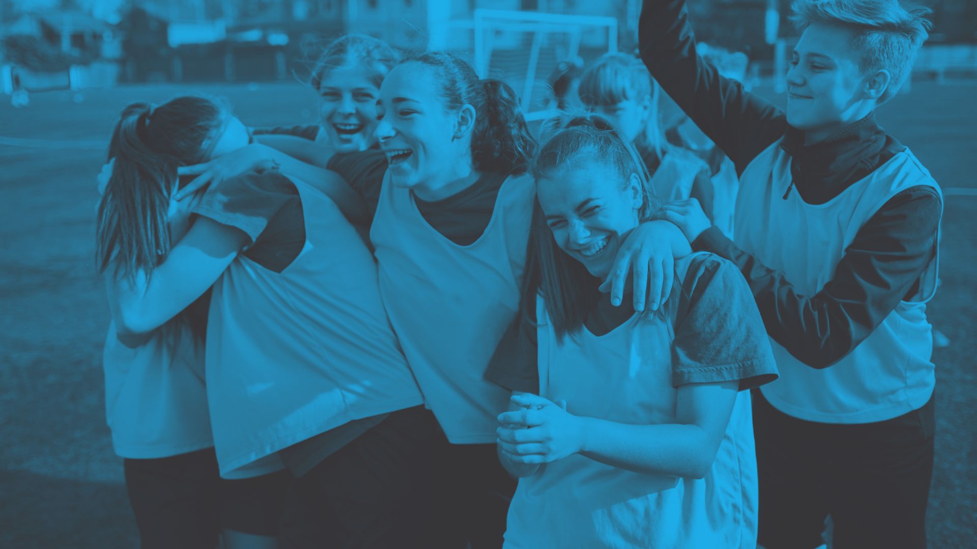 Photo of girls playing grassroots football